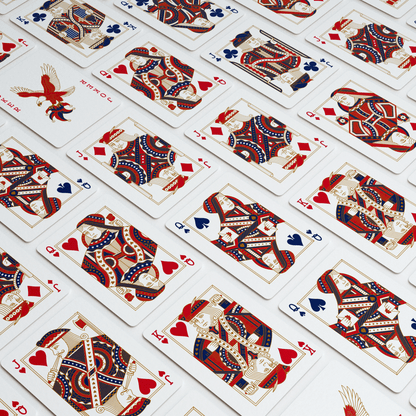 Custom red, white, blue, and gold court cards and eagle Jokers from the Remembrance America 250 playing card deck on green felt